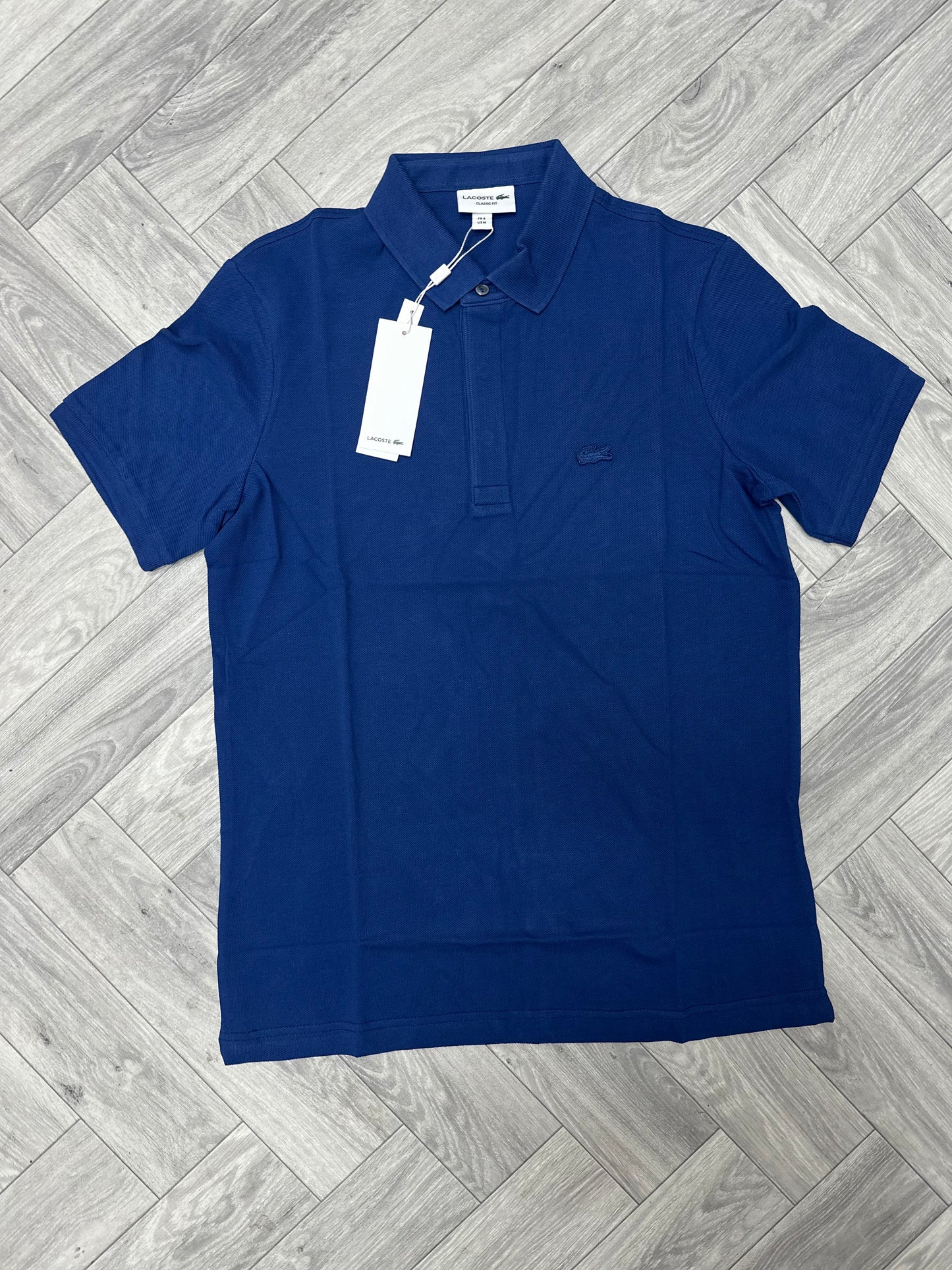 Lacoste kragna